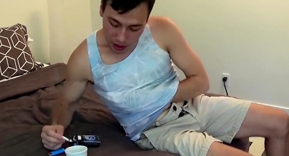 Tattooed amateur smoker Blake Stone cums while masturbating solo