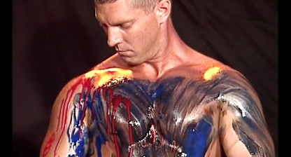Junkyard Boy Dillon Day Paints His Muscular Body
