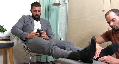 Handsome bearded businessman foot licked and worshipped
