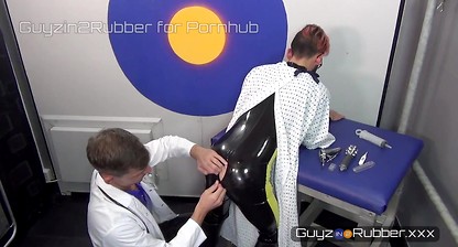 Hot Guy in Rubber asks his Doctor to stretch his arse and fuck him before he goes to a fetish party