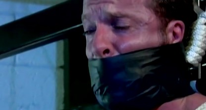 Derek is bound and has his balls pulled tight