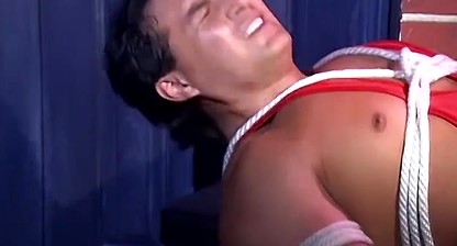 Muscular man Vincenzo is bound with rope