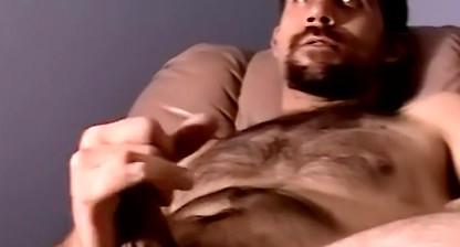 Hairy bearded stud Weasel cums while masturbating solo